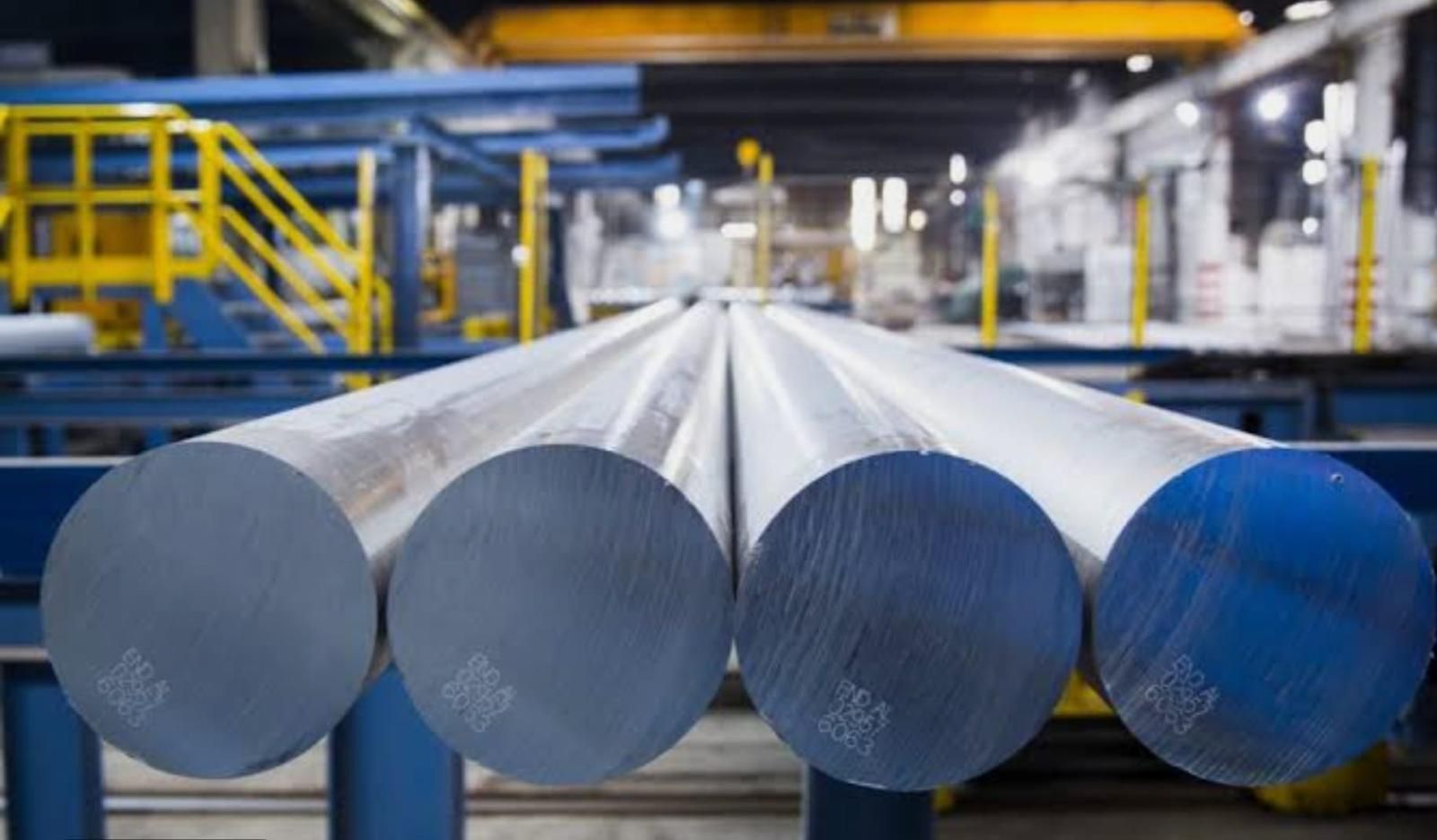 Extruded aluminium billets on the run-out table of an extrusion plant